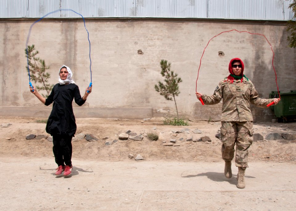 Sgt.Jaclyn R.Hill in a jump rope competition with a student from Setara school. (8014489380)