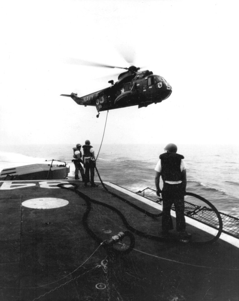 SH-3A Sea King of HS-4 is refueled by USS Fiske (DD-842) off Vietnam in March 1966