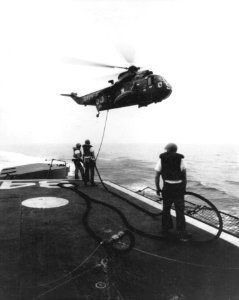 SH-3A Sea King of HS-4 is refueled by USS Fiske (DD-842) off Vietnam in March 1966