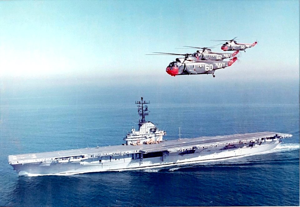 SH-3A Sea Kings of HS-6 flying over USS Kearsarge (CVS-33) c1963