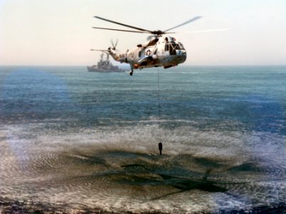 SH-3H Sea King of HS-6 lowering sonar c1977