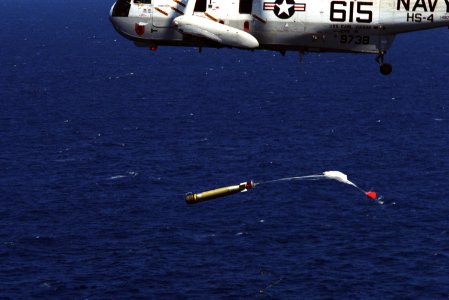 SH-3H from HS-4 drops Mk 46 torpedo 1987