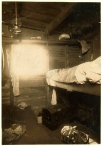 Shack of Jo. Mermilla family, cranberrries pickers on Whites Bog, Browns Mills, N.J in settlement called Florence. Six persons live in this room. One bed on floor. Food exposed to flies, LOC nclc.00088