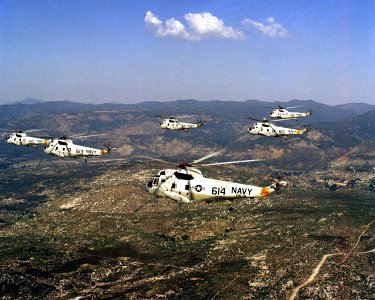 SH-3H Sea Kings of HS-12 in flight 1983