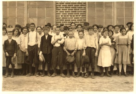 Shaw Cotton Mills. Overseer grouped all the workers, and several of them are surely under 13, and several began work under 13 last year. LOC nclc.02968