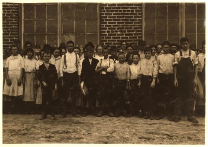 Shaw Cotton Mills. Overseer grouped all the workers, and several of them are surely under 13, and several began work under 13 last year. LOC nclc.02975