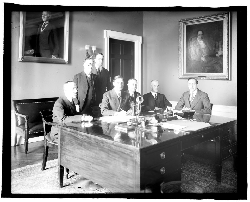 Signing of Russian War Loan, 1917. Shown- Constantine Onou, Russian Embassy; Frank L. Polk; Serge Ughet, Russian Embassy; Sec. McAdoo LCCN2016852592