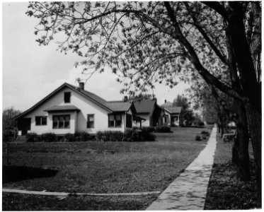 Shelby County, Iowa. Homes in the village are almost all comfortable and well-kept. Beyond this, the . . . - NARA - 522322