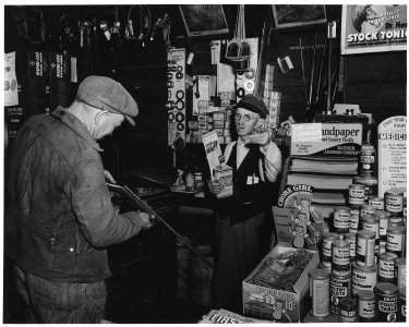 Shelby County, Iowa. Other buildings and businesses in Irwin. ...(This is an image of) a hardware st . . . - NARA - 522355