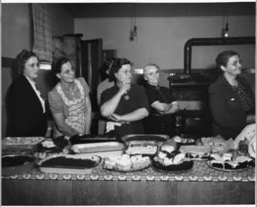 Shelby County, Iowa. Informal get-togethers are still very popular in Irwin. Shown here is a group o . . . - NARA - 522386