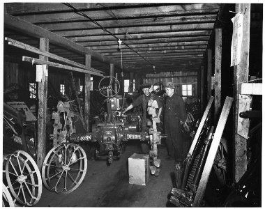 Shelby County, Iowa. Other buildings and businesses in Irwin.... The farm machinery shop...is doing . . . - NARA - 522357