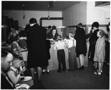 Shelby County, Iowa. Informal get-togethers are still very popular in Irwin. Shown here is a group o . . . - NARA - 522387