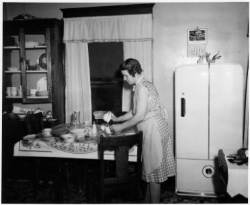 Shelby County, Iowa. Kitchen and living room in the dwelling of a medium-sized owner-operated farm. . . . - NARA - 522368