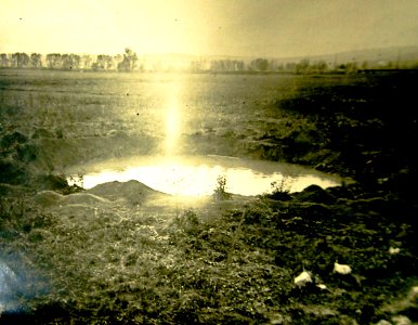 Shell crater made by the explosion of one of the larger shells, France, WWI (32250760706)