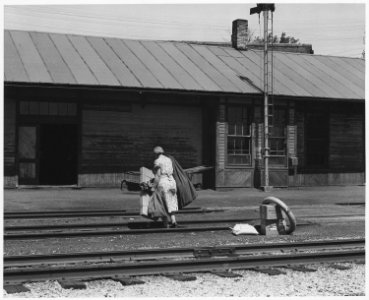 Shelby County, Iowa. Several trains a day stop at the Irwin depot, most of them just long enough to . . . - NARA - 522352
