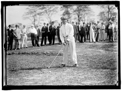 SHERMAN PLAYING GOLF LOC hec.00298