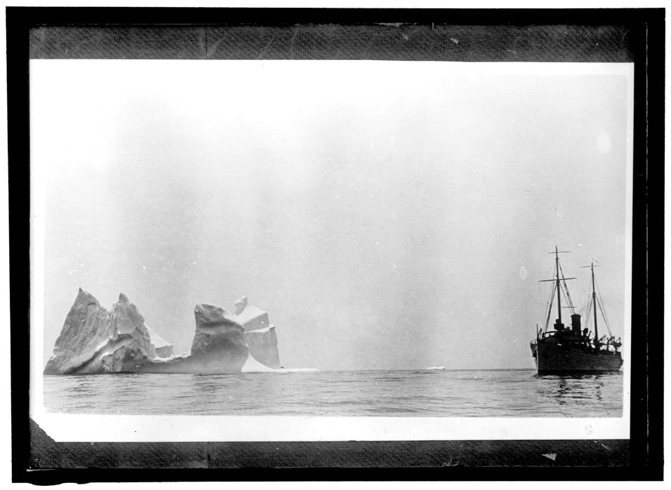 Ship at sea near iceberg LOC hec.01902