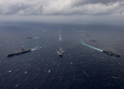 Ships from the Indian Navy, Japan Maritime Self-Defense Force and the United States Navy sail in formation in the Bay of Bengal during exercise Malabar 2017