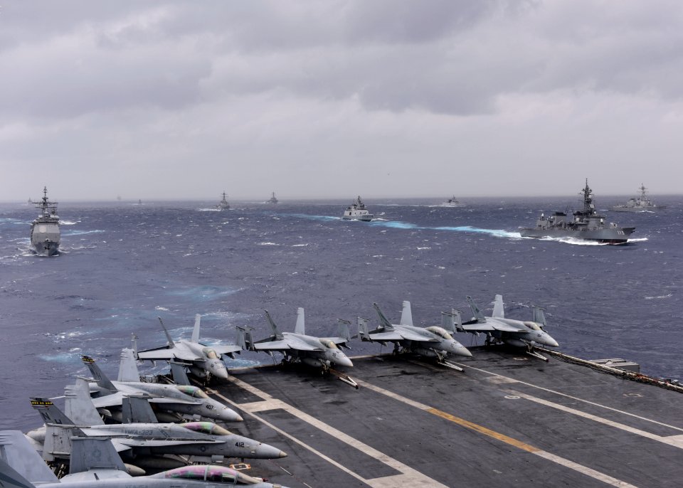 Ships from the Indian Navy, JMSDF and the United States Navy sail in formation in the Bay of Bengal during exercise Malabar 2017