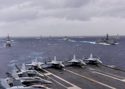 Ships from the Indian Navy, JMSDF and the United States Navy sail in formation in the Bay of Bengal during exercise Malabar 2017