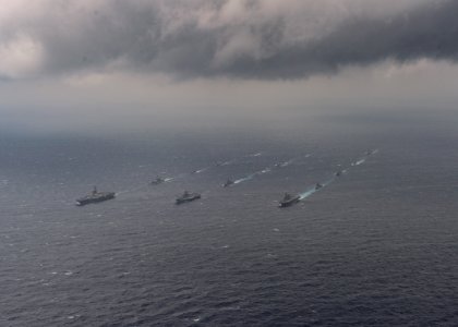 Ships from the Indian Navy, Japan Maritime Self-Defense Force (JMSDF) and the United States Navy sail in formation in the Bay of Bengal during exercise Malabar 2017