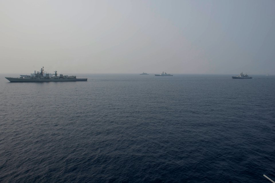 Ships from the Indian Navy, the Chinese People’s Liberation Army (Navy), and the Indonesian Navy steam in formation alongside the Ticonderoga-class guided-missile cruiser USS Antietam (CG 54) during an exercise