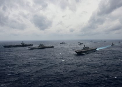 Ships from the Indian Navy, Japan Maritime Self-Defense Force and the U.S. Navy sail in formation in the Bay of Bengal during exercise Malabar 2017