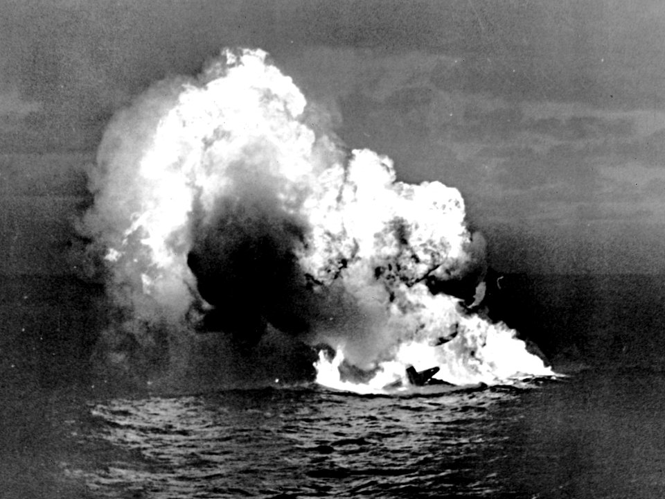 Shot down Mitsubishi G4M burning on the water c1944