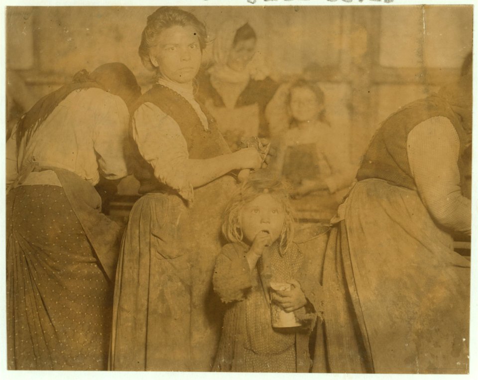 Shuckers in the Varn & Platt Canning Company. This is 4 year old Mary in the foreground. Was helping some. 6 of the shuckers were 10 years and up to 12. LOC cph.3b14404