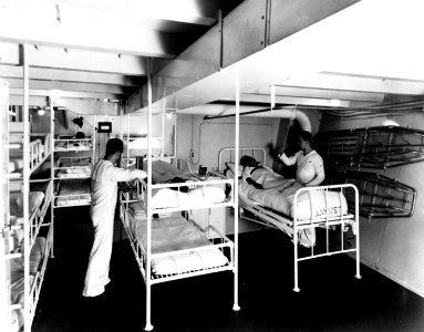 Sickbay ward aboard USS Charger (AVG-30) on 3 August 1942 (NH 94752)
