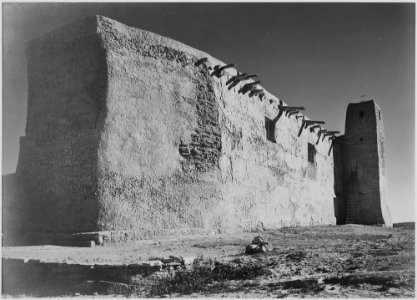 Side wall and tower with cross, Church, Acoma Pueblo. (National Historic Landmark, New Mexico) (Misicn de San Estevan - NARA - 519835