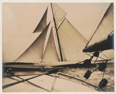 Side view of the yacht Reliance, winner of 1903 America's Cup, from end of unidentified sailboat LCCN90709783