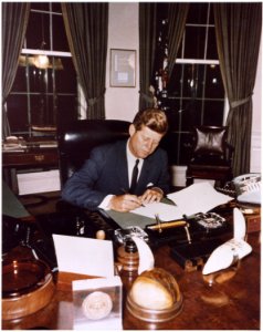 Signing Cuba Quarantine Proclamation. President Kennedy. White House, Oval Office. - NARA - 194218 photo
