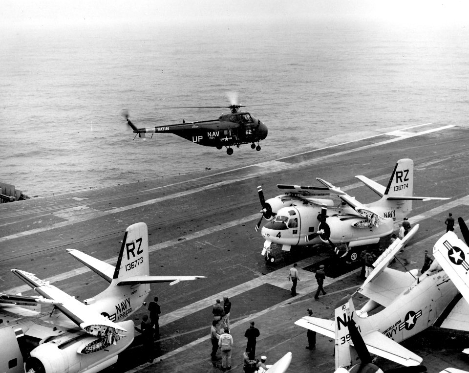 Sikorsky CH-19E of HU-1 in flight over USS Constellation (CVA-64), 11 May 1963 (NNAM.2011.113.403)