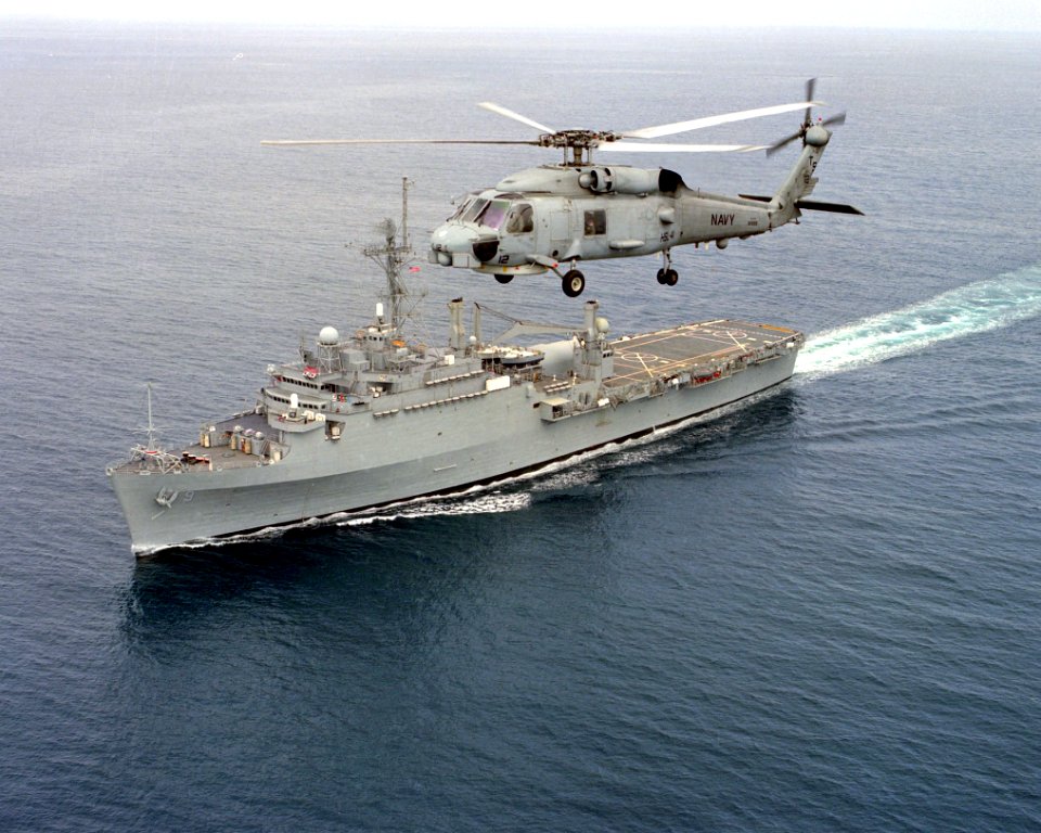 Sikorsky SH-60B Seahawk of HSL-41 flies over USS Denver (LPD-9) on 30 September 1997 (970930-N-0000U-016)