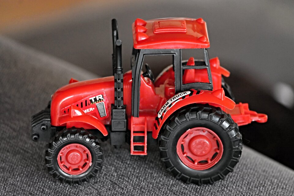 Red agriculture tractors
