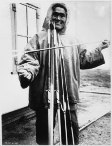 Simiguluk, an Eskimo spear and lancemaker with his wares, Point Barrow, Alaska, 1935 - NARA - 531121 photo
