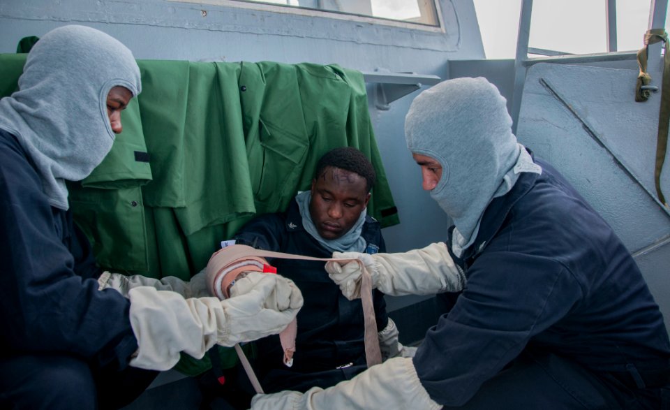 Simulated casualty during general quarters drill 141004-N-QC631-204