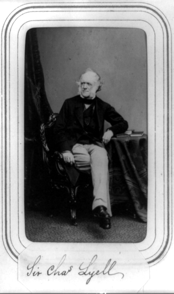Sir Charles Lyell, full-length portrait, seated at small table, facing left LCCN89716306