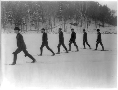 Six men walking on snowshoes LCCN2016648162