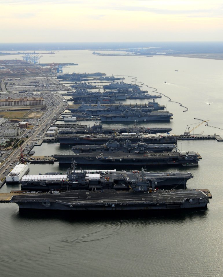 Six amphibious ships and five carriers moored in Norfolk. (8293467889)