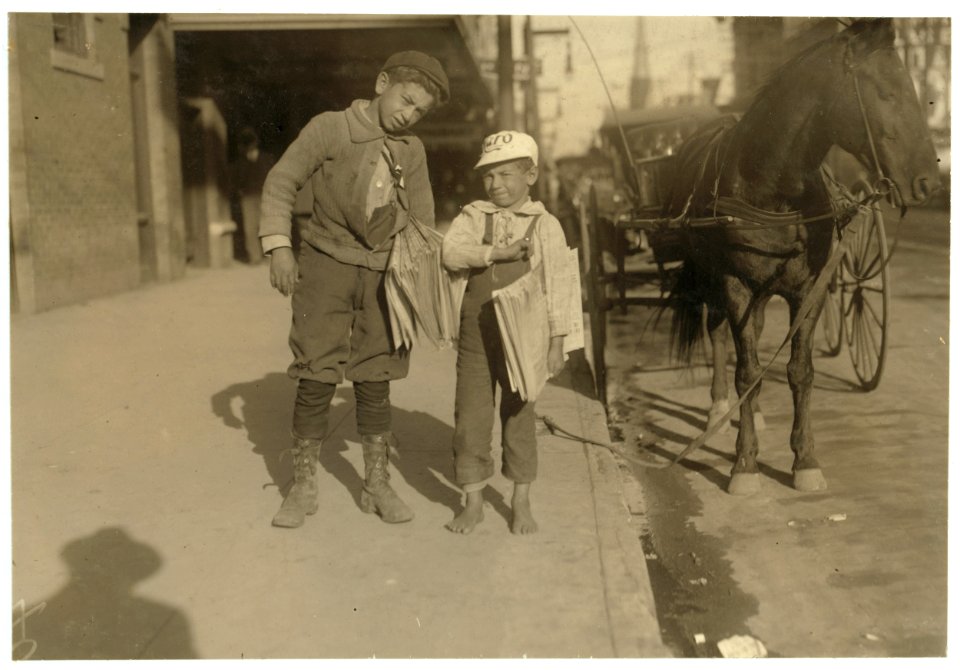 Six-year old boy, Louis Shuman, and his 11 year old brother. Dallas Newsboys. The little fellow usually has a brother who makes him do most of the work. Dallas has too many of these little LOC nclc.03904