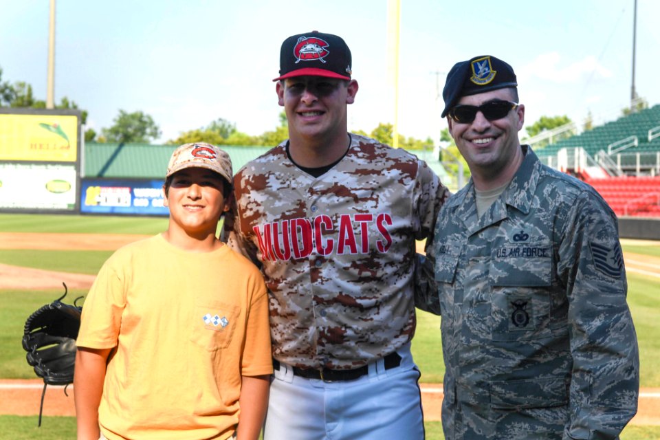 SJ Airman throws the first pitch