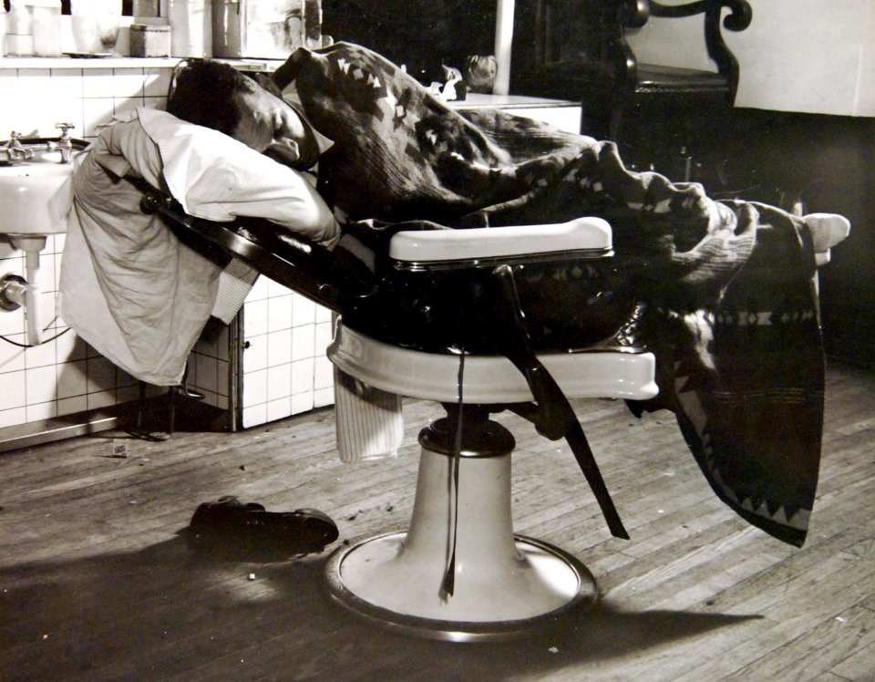 Sleeping in a barber chair. Rented for $1.50 a night, May 1942 (34211707214)