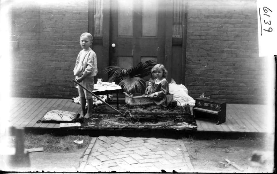 Small boy with girl in wagon 1904 (3195507140)
