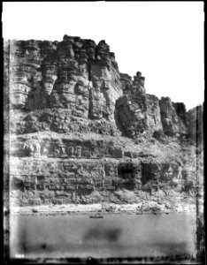 Small boat crossing the Colorado River in Marble Canyon, Grand Canyon, 1900-1930 (CHS-3894)