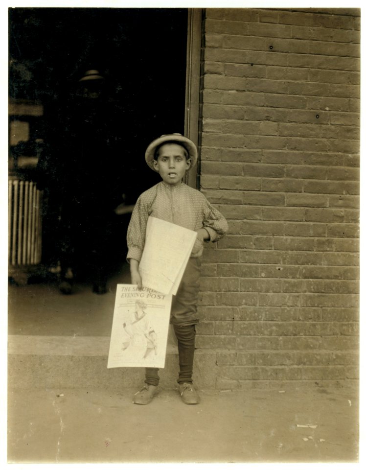 Small newsie at depot, Burlington, Vt. LOC nclc.03370
