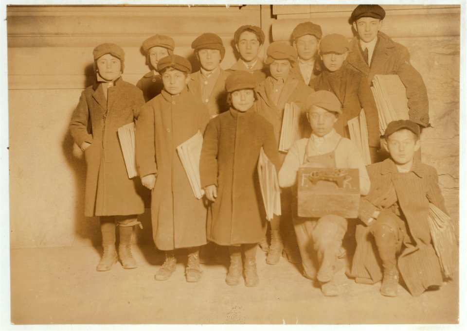 Smallest boy is Isidor Kline, 8 yrs. Old. Sells until 7 P.M. sometimes. On his right is Bennie Friedman, 7 yrs. old. Sells until 9 P.M., sometimes. Taken at 5-30 P.M. LOC nclc.03833
