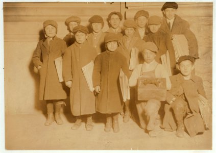 Smallest boy is Isidor Kline, 8 yrs. Old. Sells until 7 P.M. sometimes. On his right is Bennie Friedman, 7 yrs. old. Sells until 9 P.M., sometimes. Taken at 5-30 P.M. LOC nclc.03833