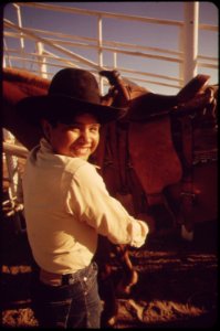 Smiling-participant-in-the-junior-rodeo-sponsored-by-the-parker-indian-rodeo-association-and-held-on-the-colorado-river-indian-reservation-may-1972 7006601538 o photo